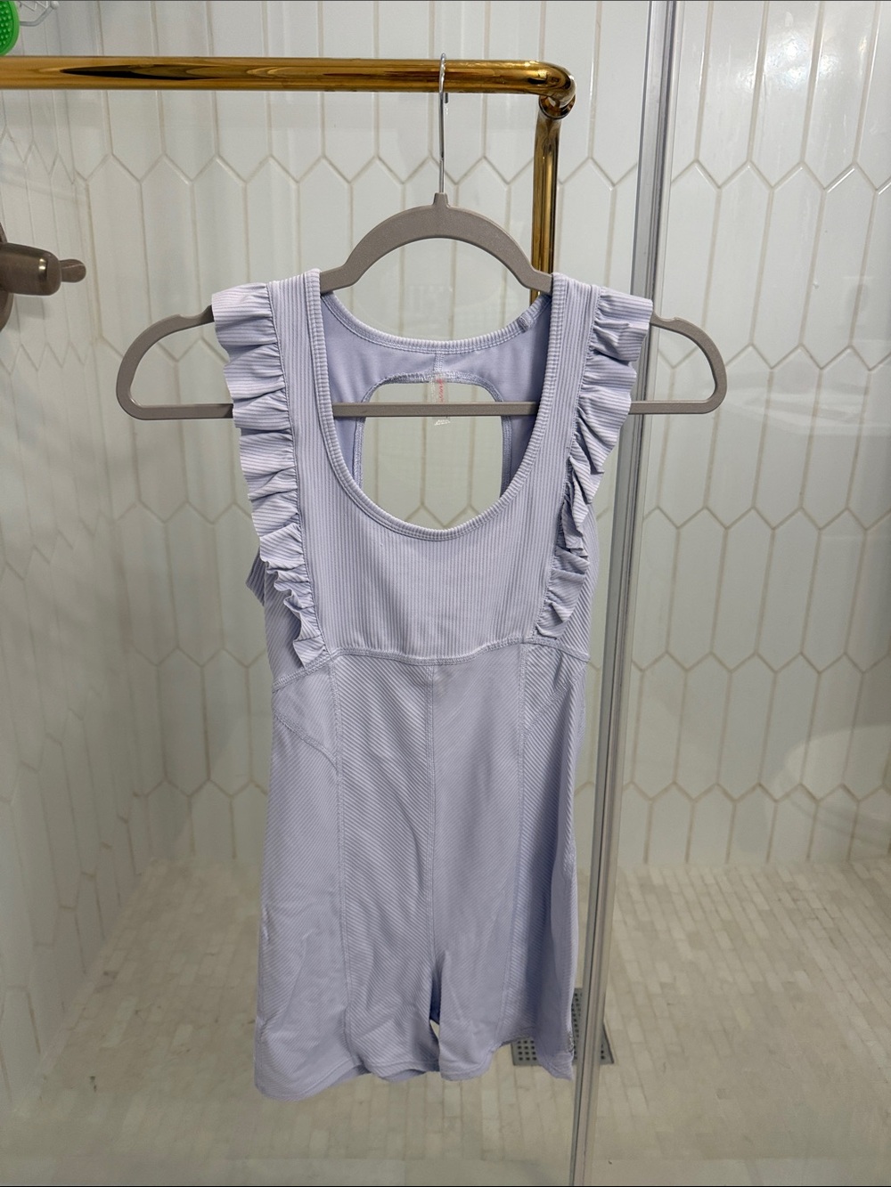 Free People Movement - Ruffled Sleeveless Lilac Romper